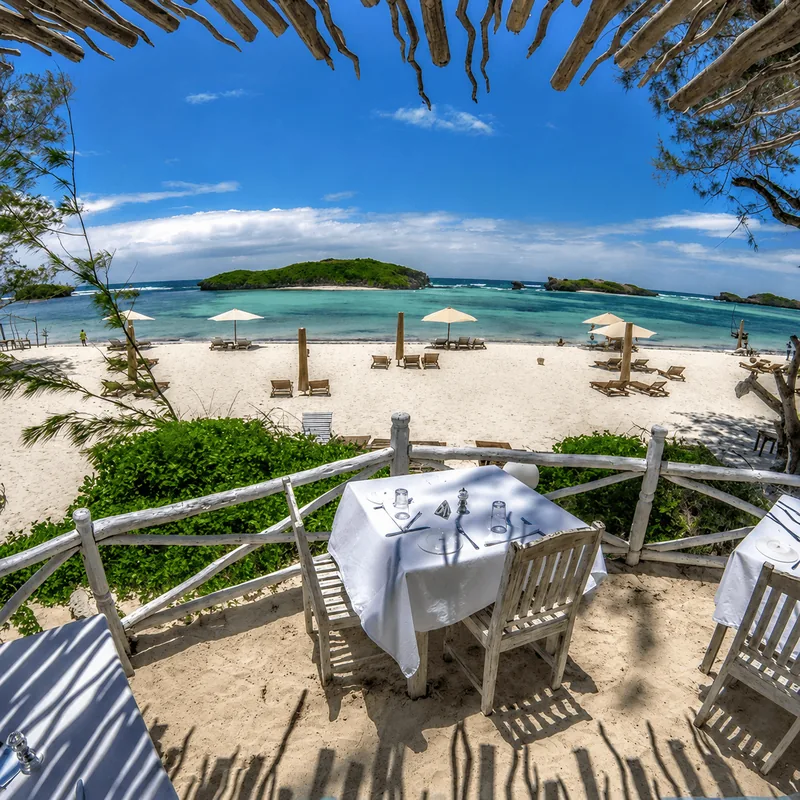 A set table looking out over the beach